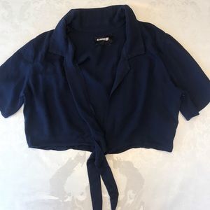 This is a reformation top with a front tie. Size 2
